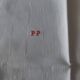 Set of seven monogram PP damask cotton napkins 56 x 56 cm