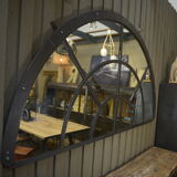 Rounded industrial mirror in riveted metal 1920