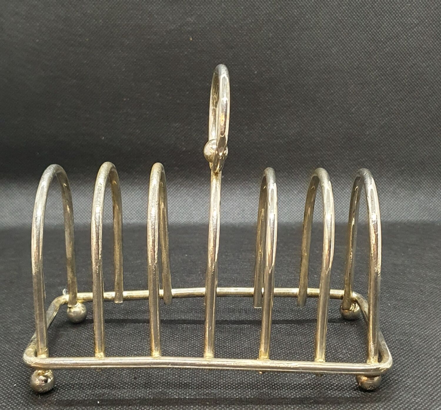 Toast holder in silver metal