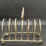 Toast holder in silver metal