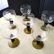 6 white wine glasses from Alsace with an engraved decoration of grape clusters.