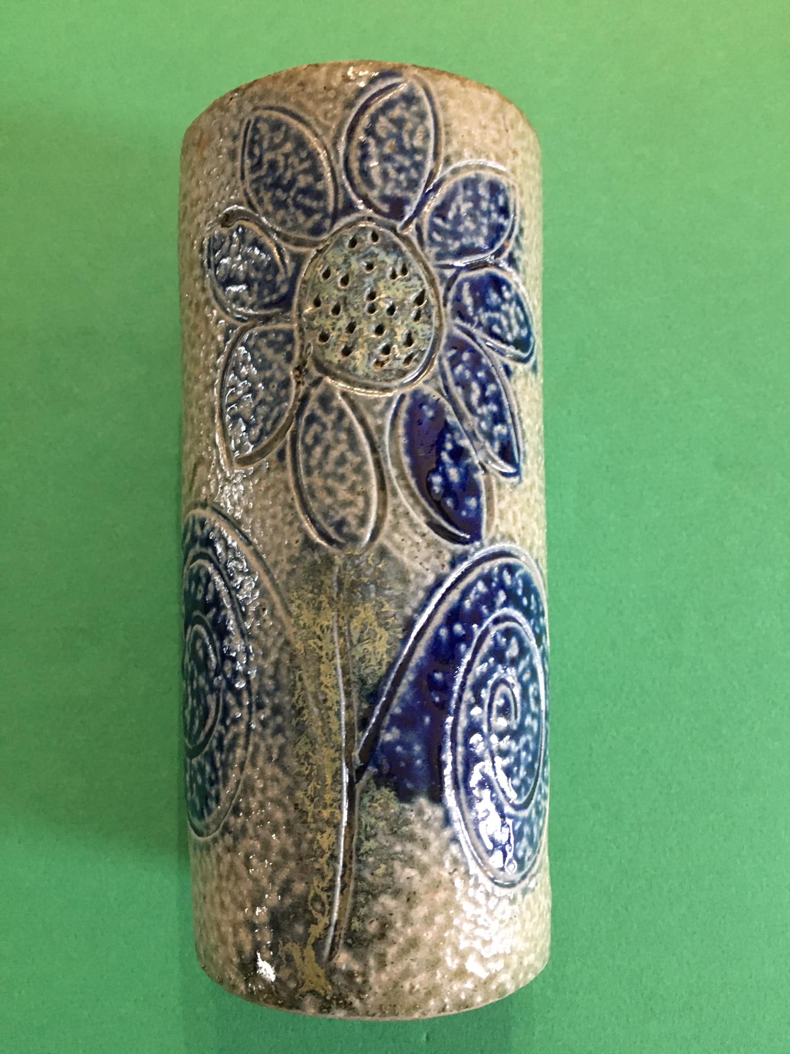 Sandstone scroll vase signed Jean Claude Monange, daisy motif