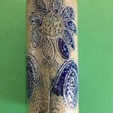 Sandstone scroll vase signed Jean Claude Monange, daisy motif