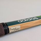 Green Adidas racket