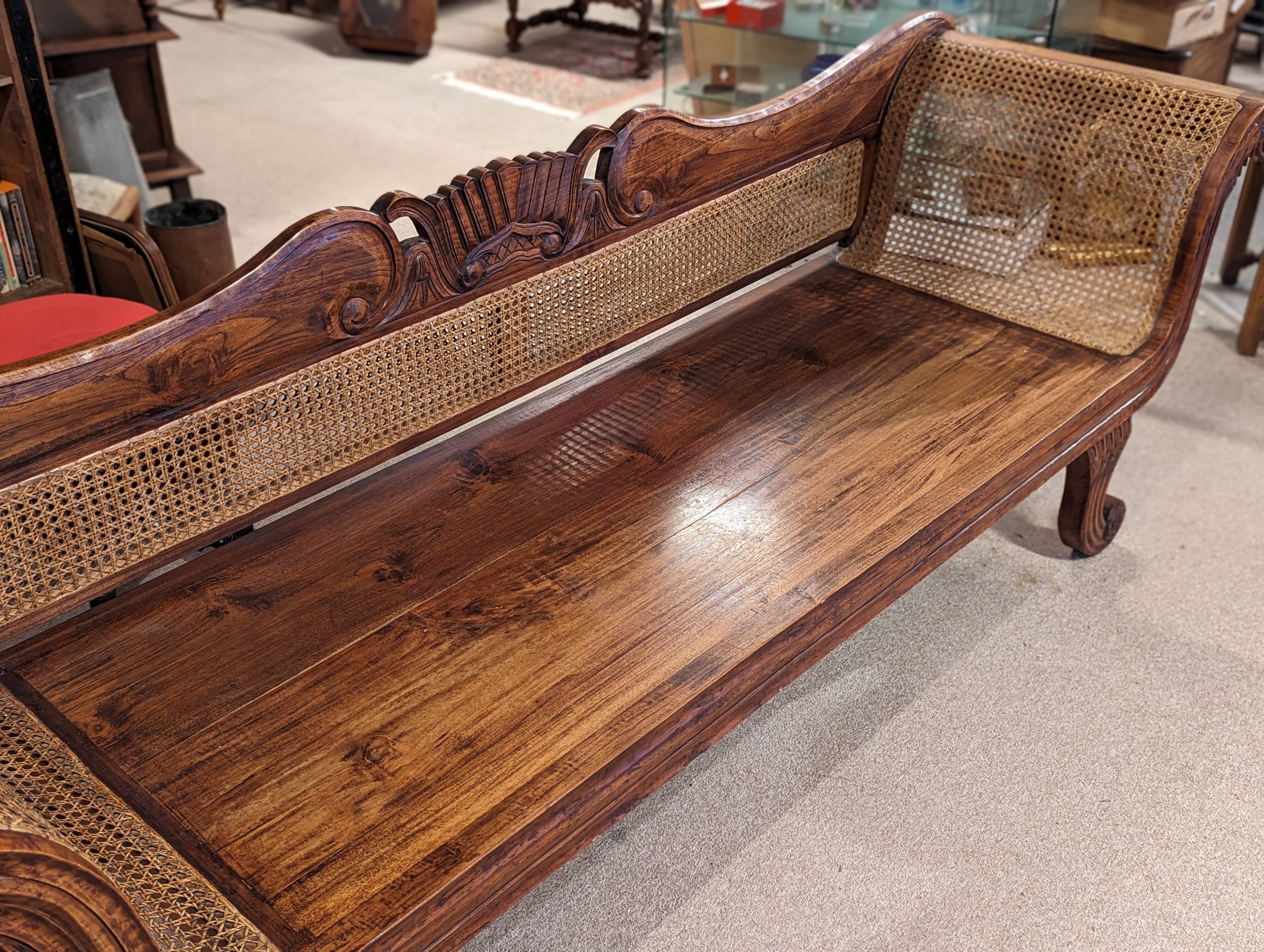 Large colonial caned bench