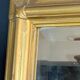 Beveled glass fireplace mirror, wood & gilded stucco, Louis XVI style floral decor