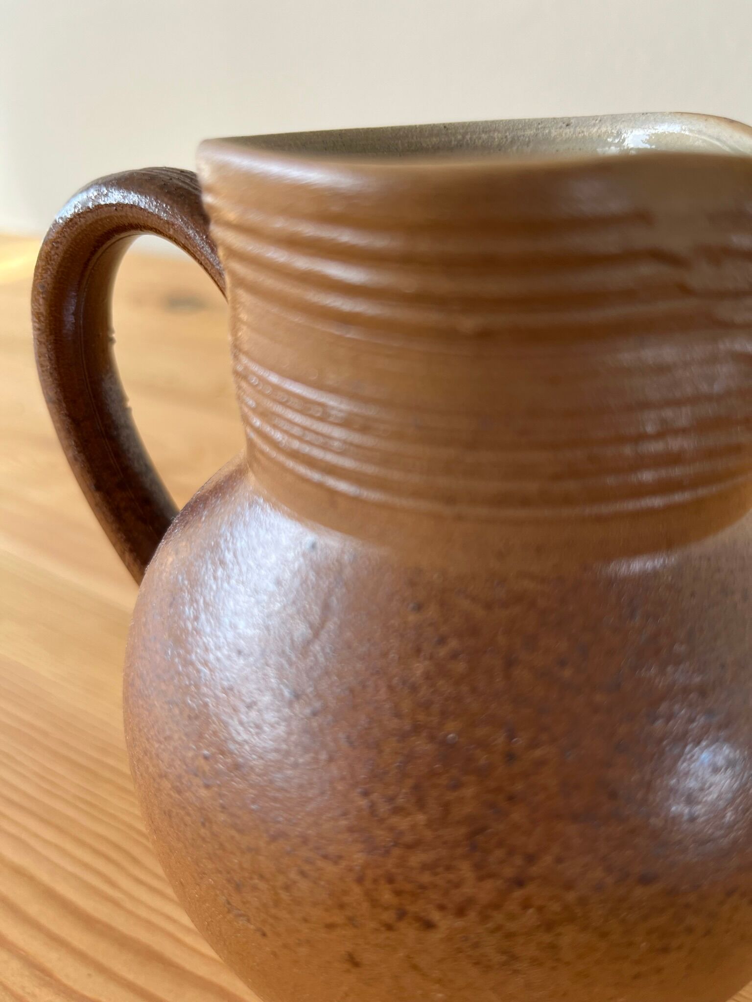 Pitcher in glazed sandstone