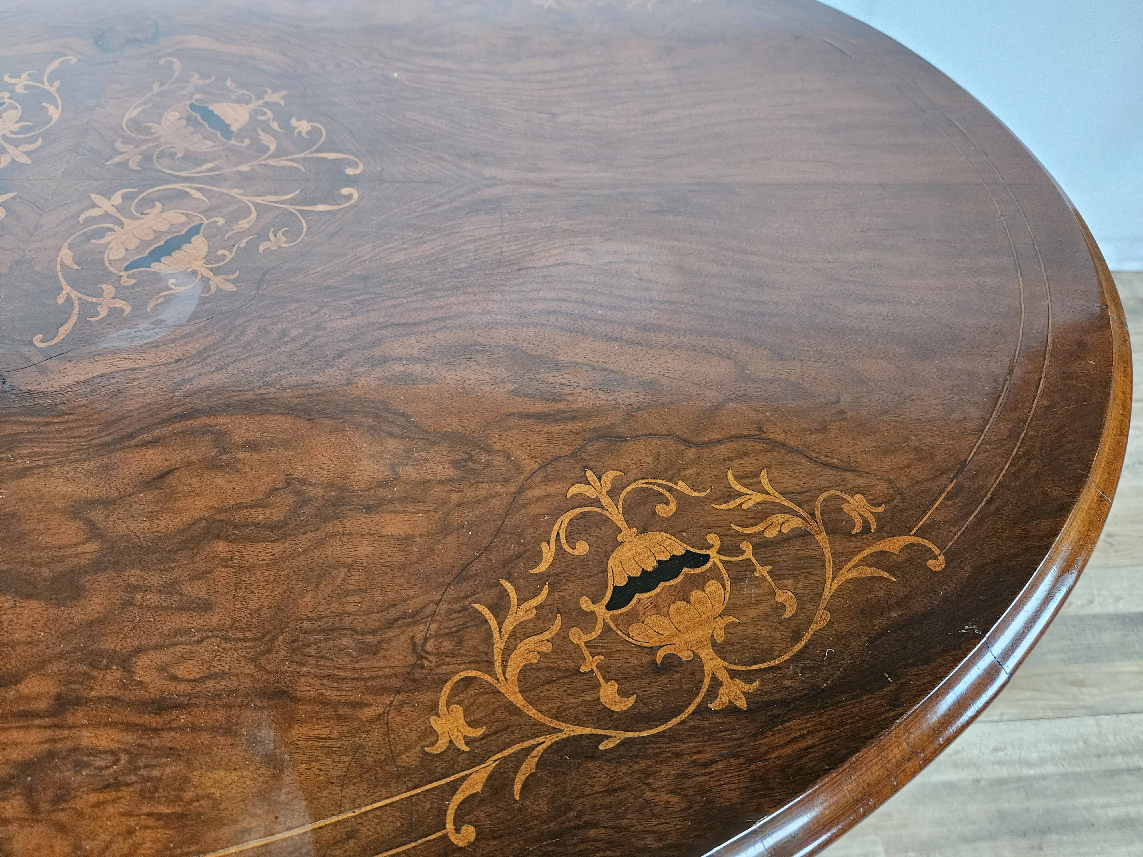 Coffee table in walnut with maple inlays and wheels
