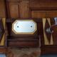 Vintage Art Deco wall coat rack in two-tone wood with engraved mirror.
