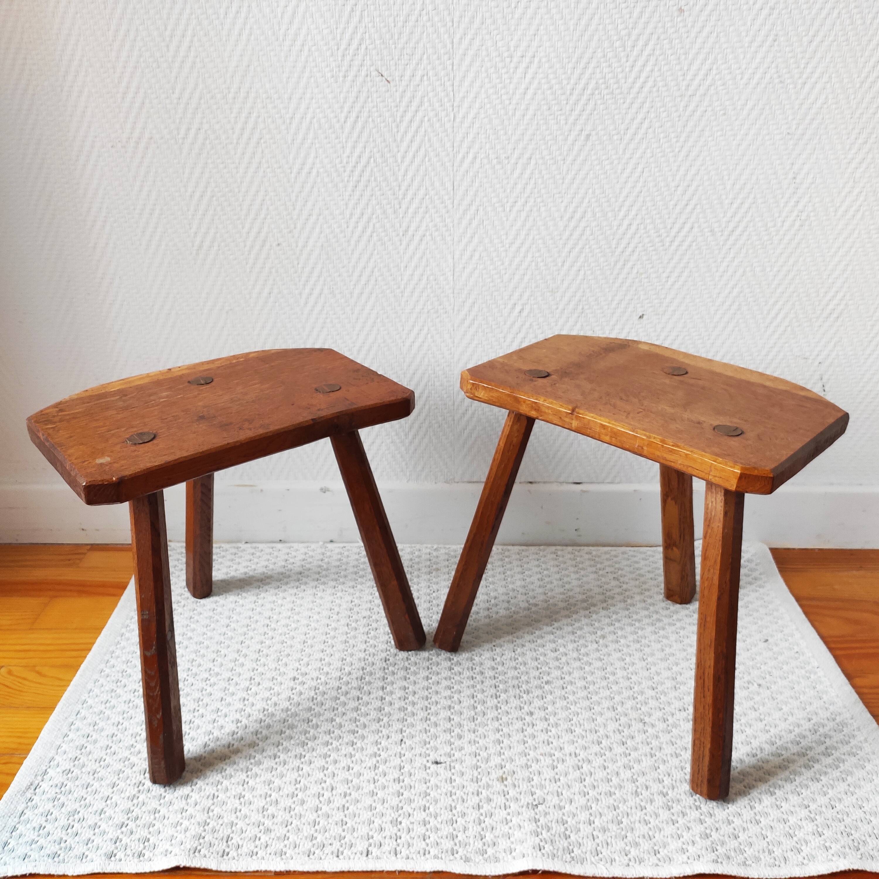 Pair of brutalist tripod stools in solid wood.