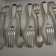 12 SFAM forks in its dark chocolate case