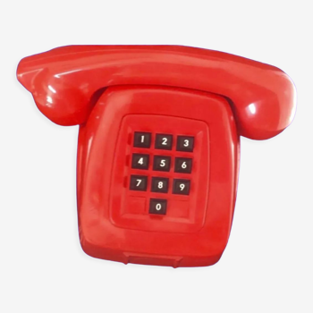 Red phone with vintage keys