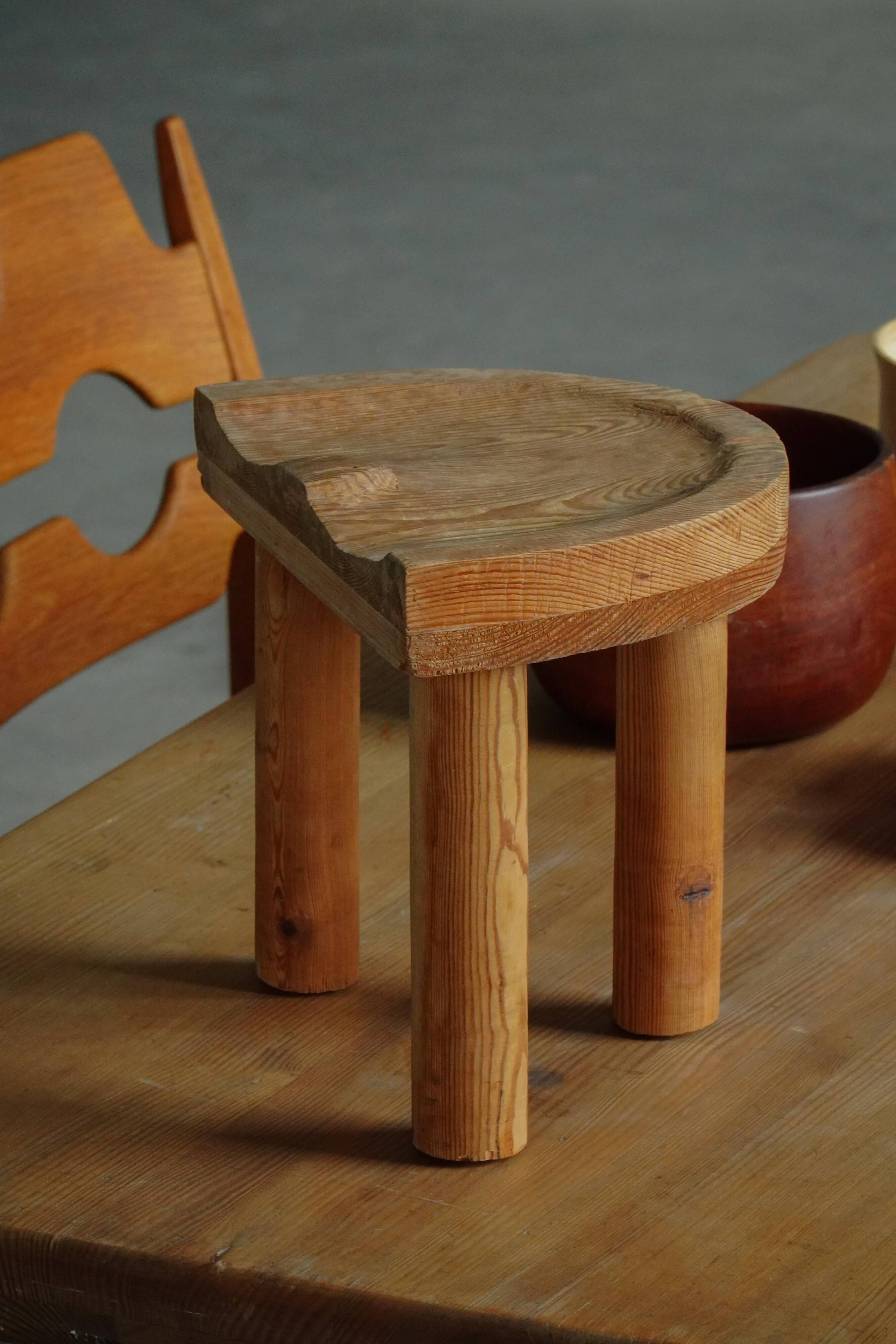 Carved pine stool, Swedish folk art, mid-20th century, 1950s.