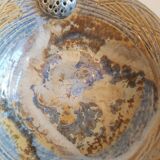 Empty pocket bowl cup on ceramic pedestal with signed spike holes