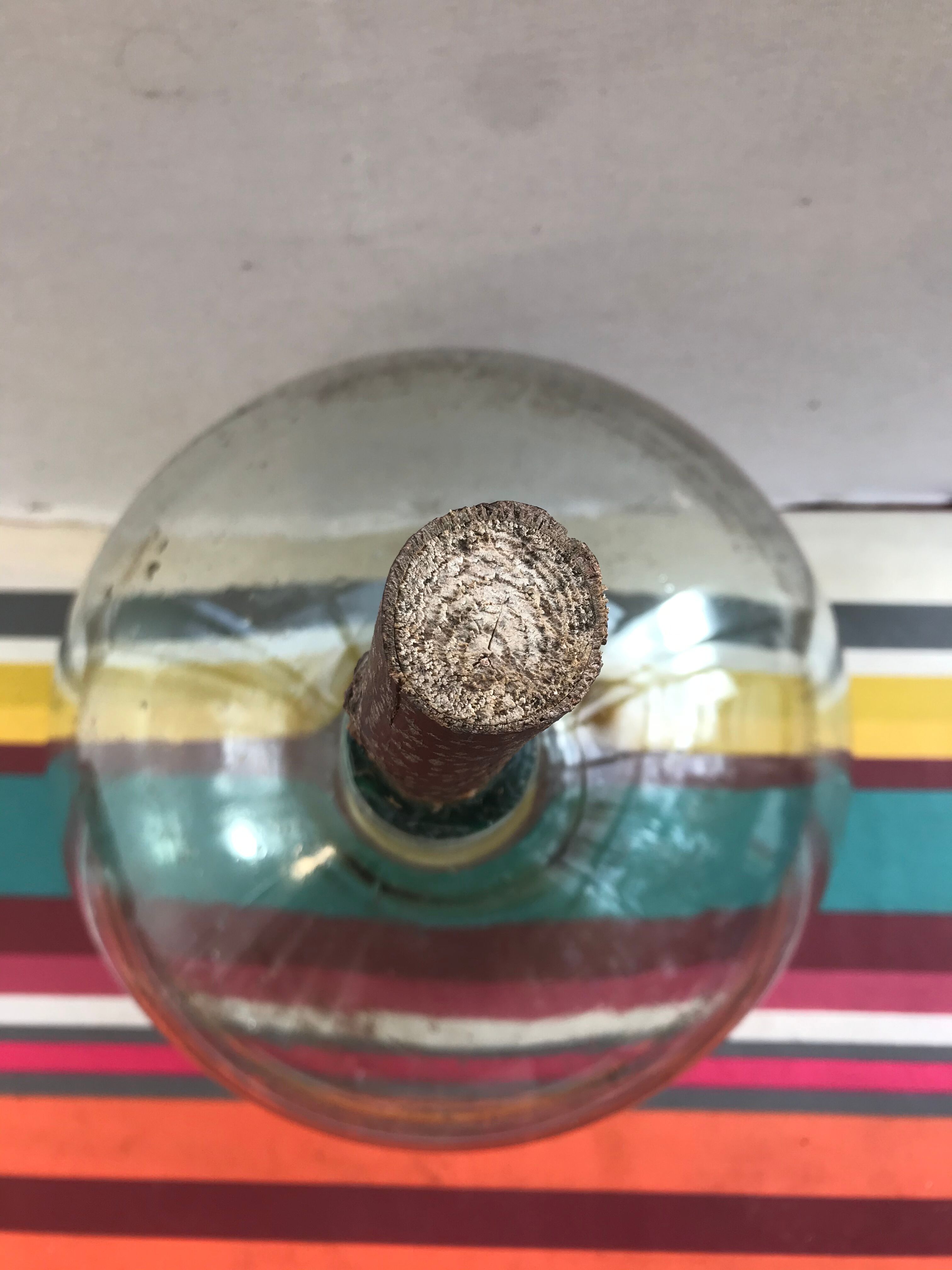 Former green glass demijohn