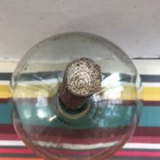 Former green glass demijohn