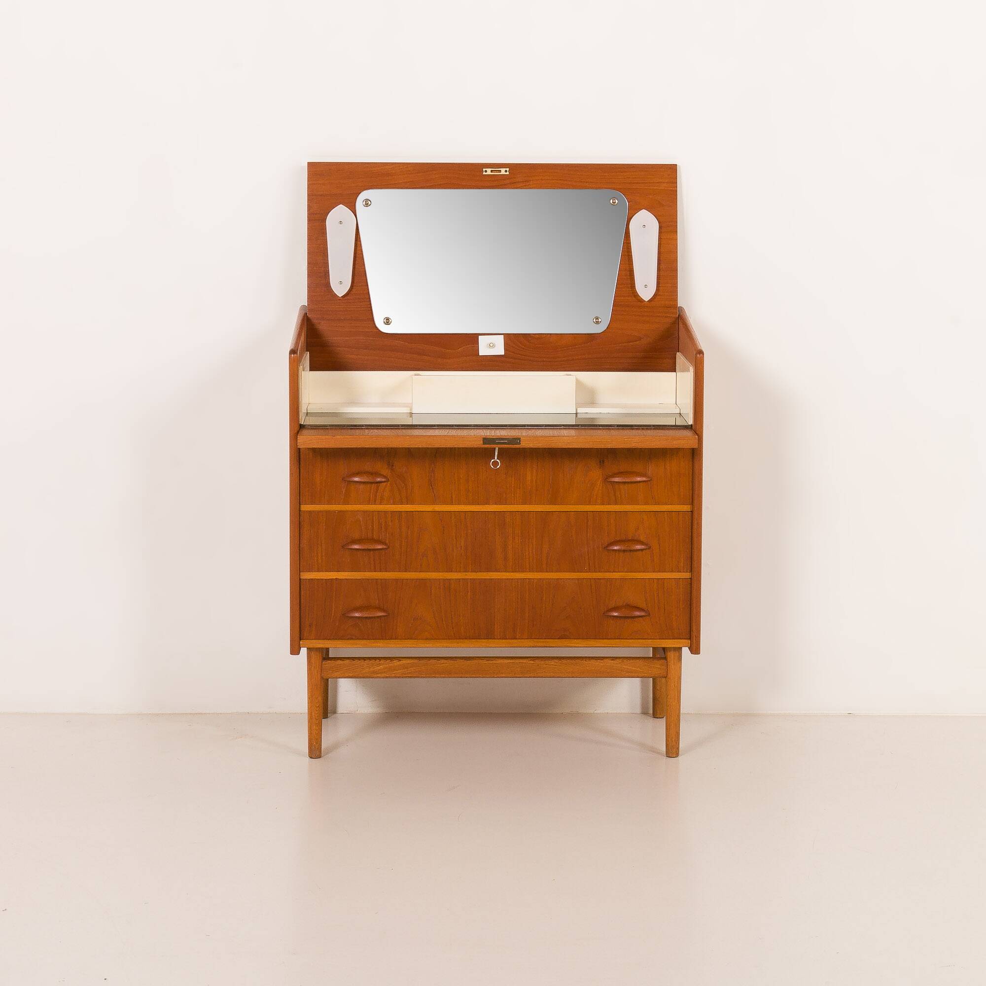 Danish teak dresser with hidden vanity and lights, 1960s