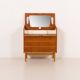 Danish teak dresser with hidden vanity and lights, 1960s