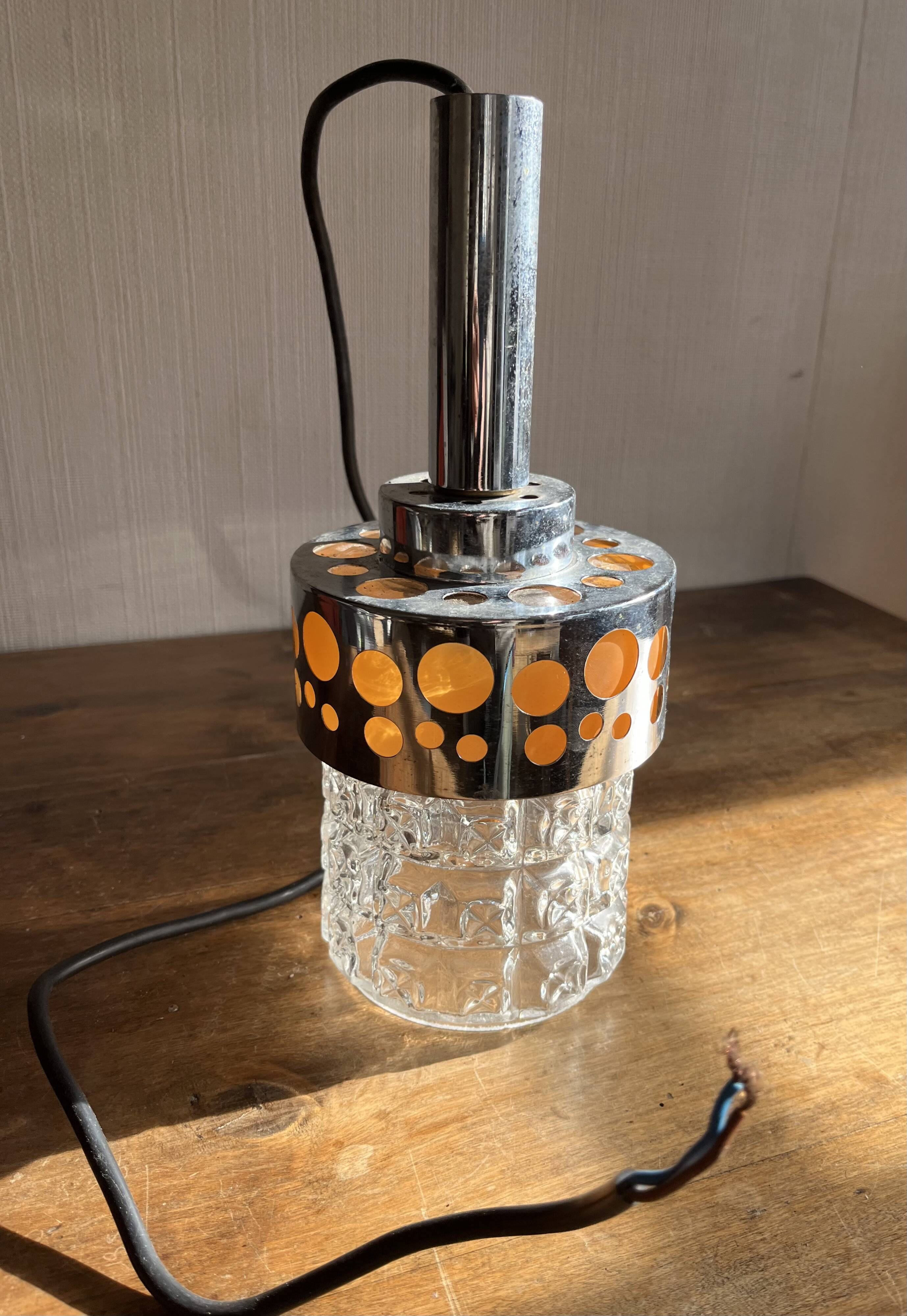 Small raak chrome and orange pendant light