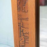 Vintage Danish wall mirror design from the 1960s in oak and stamped brass.