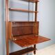 Vintage library from the 1950s-60s with a bar compartment.