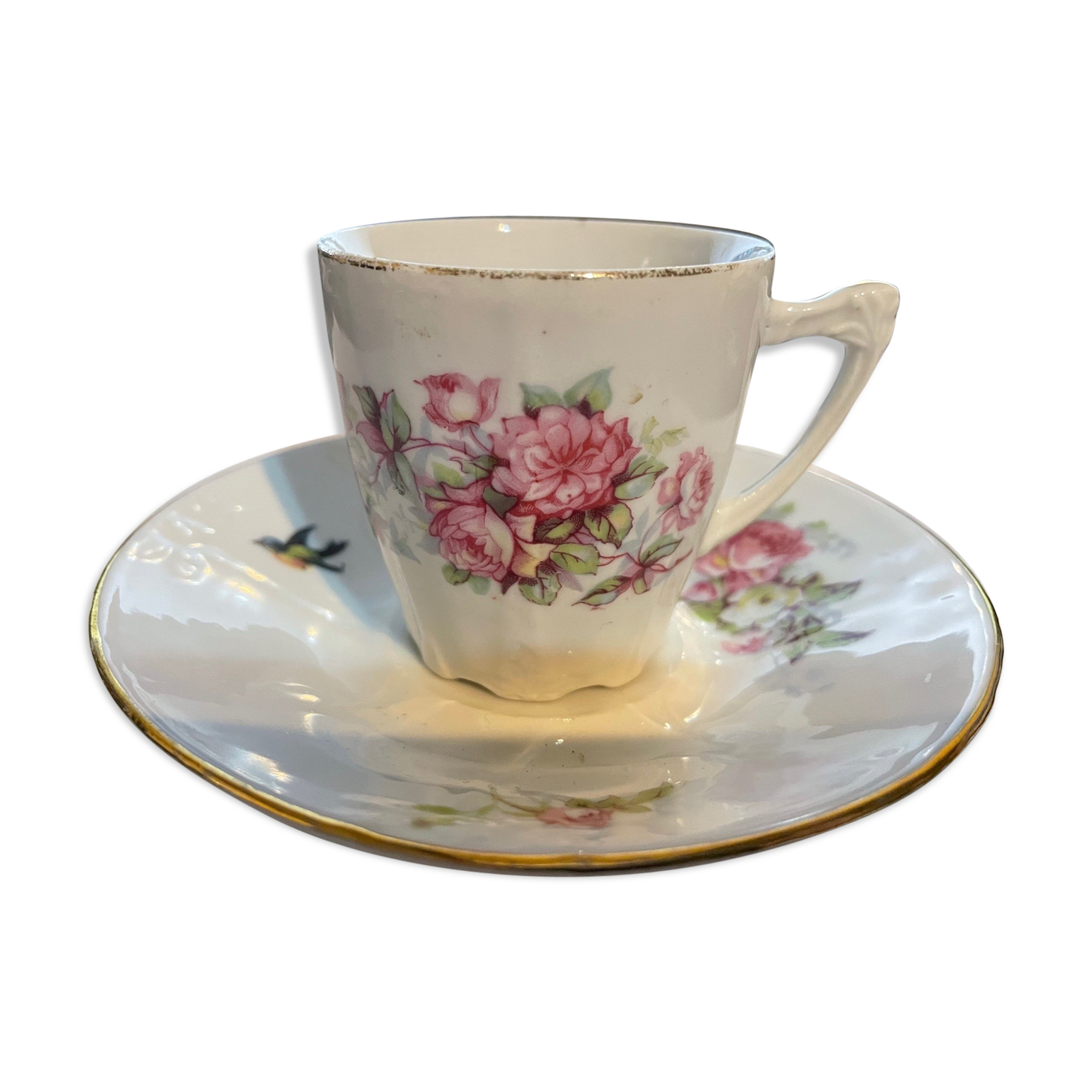 Tasse et sous tasse à décor floral et oiseau
