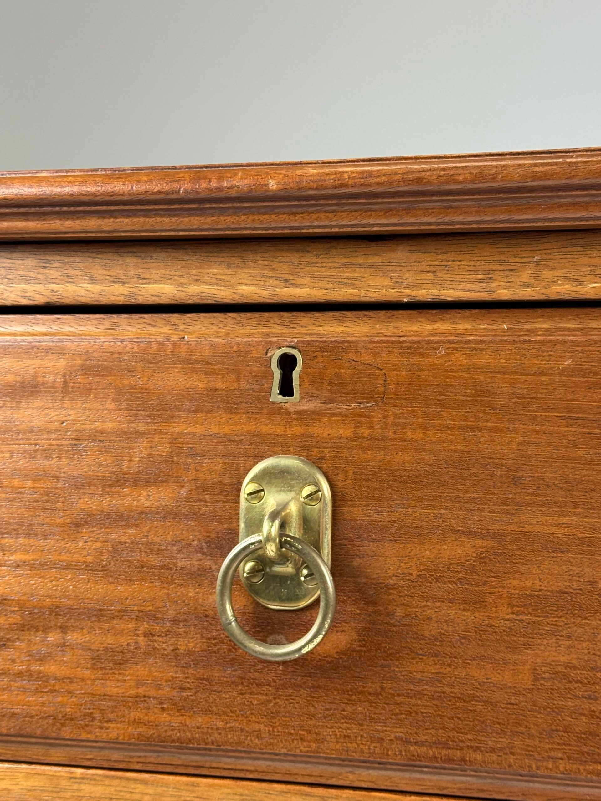 Harrods mahogany chest of drawers