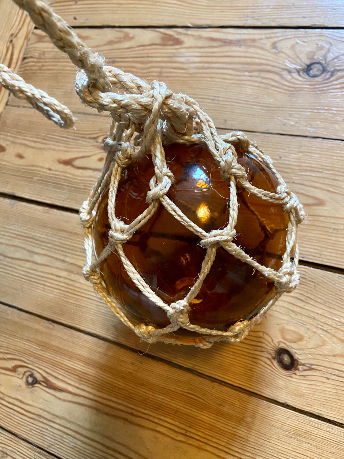 Marine float in glass and rope