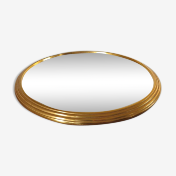 Round mirror tray in 1950s gold metal