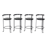 Four "Oblado" bar stools from the 80s