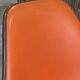 Eames Herman Miller DSR Eiffel chair in orange greige fibreglass and skai.
