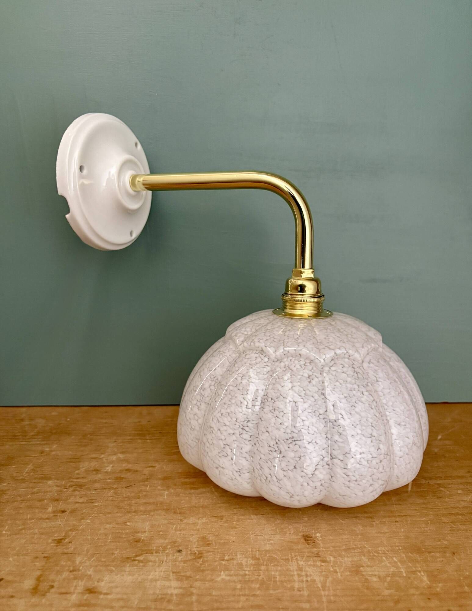 Vintage glass wall light with a curved arm from Clichy, white.