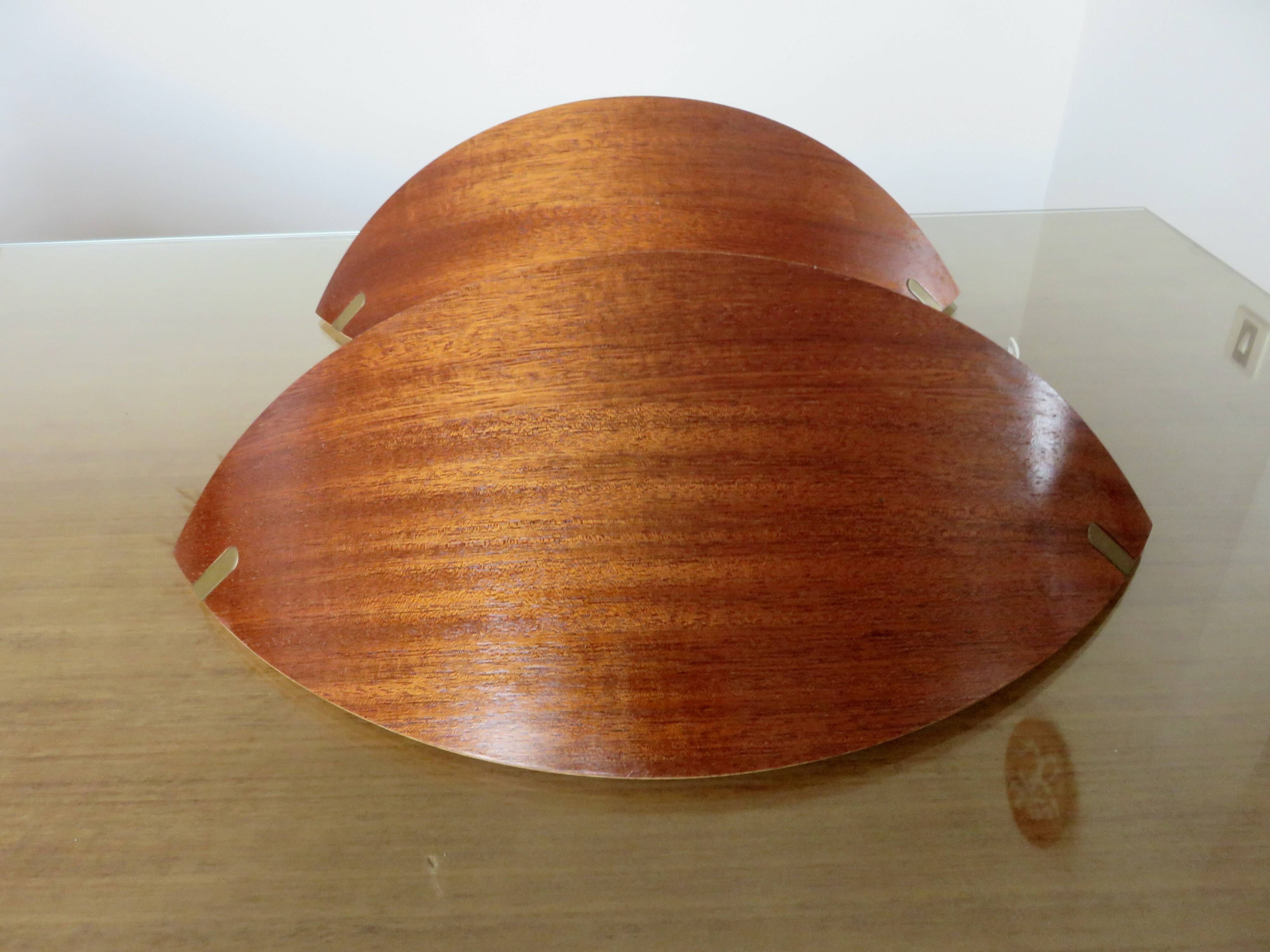 Pair of Scandinavian wall lights in bent wood with brass accents, 1980.