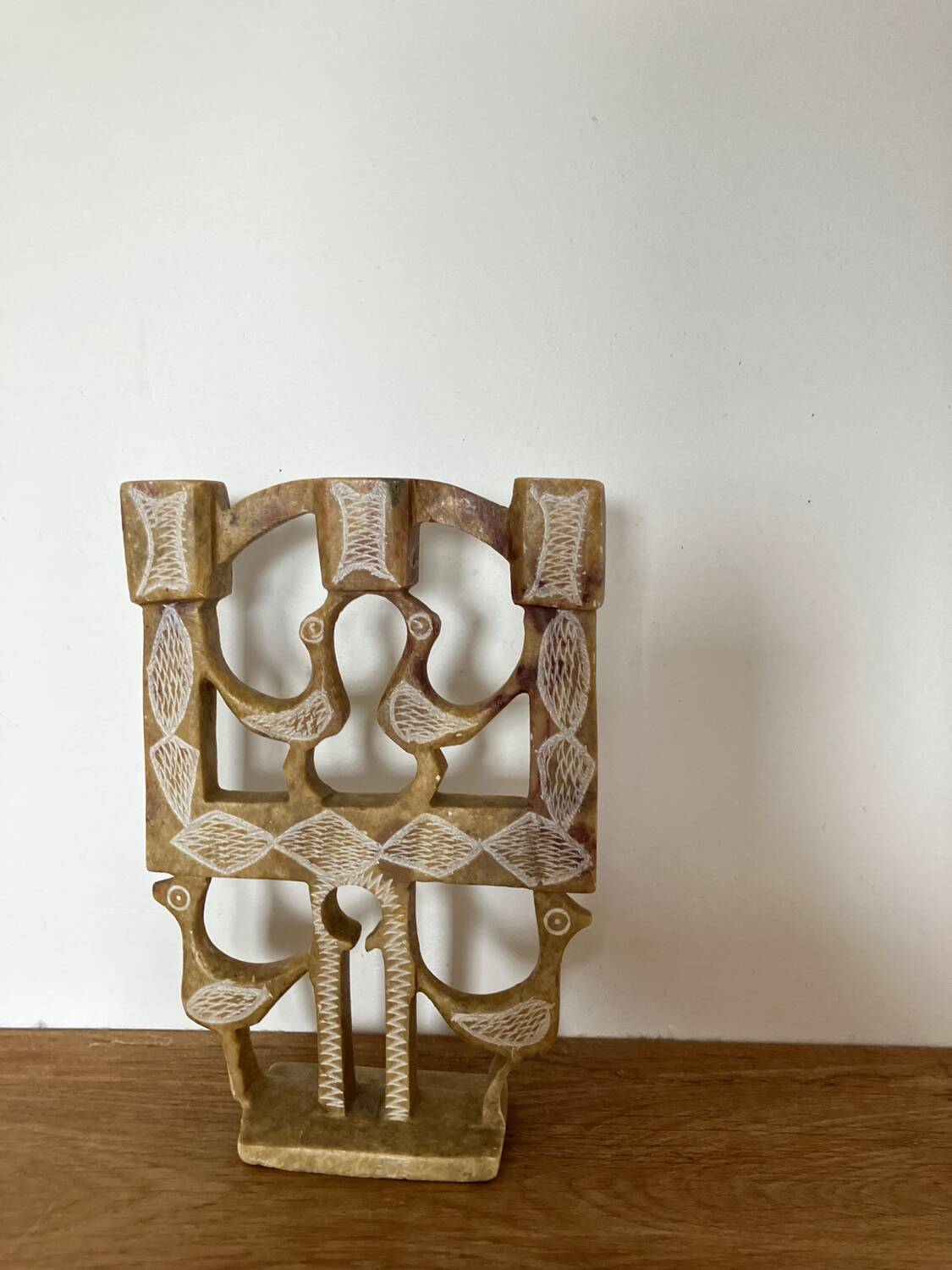 Vintage stone folk art candle holder