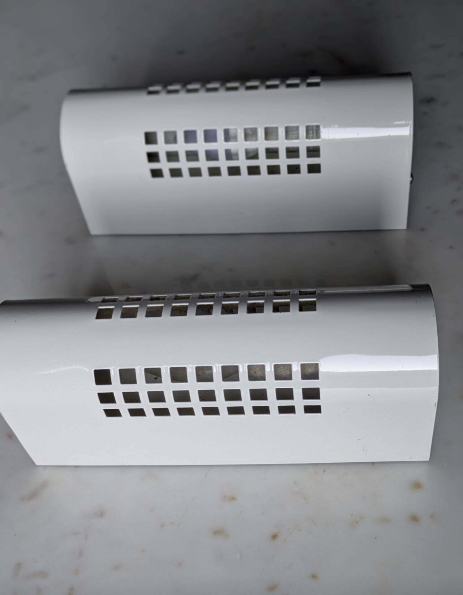 Pair of vintage wall sconces in sheet metal/Perriand/Mategot style.