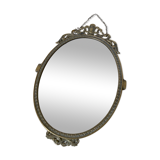 Miroir ovale en laiton doré