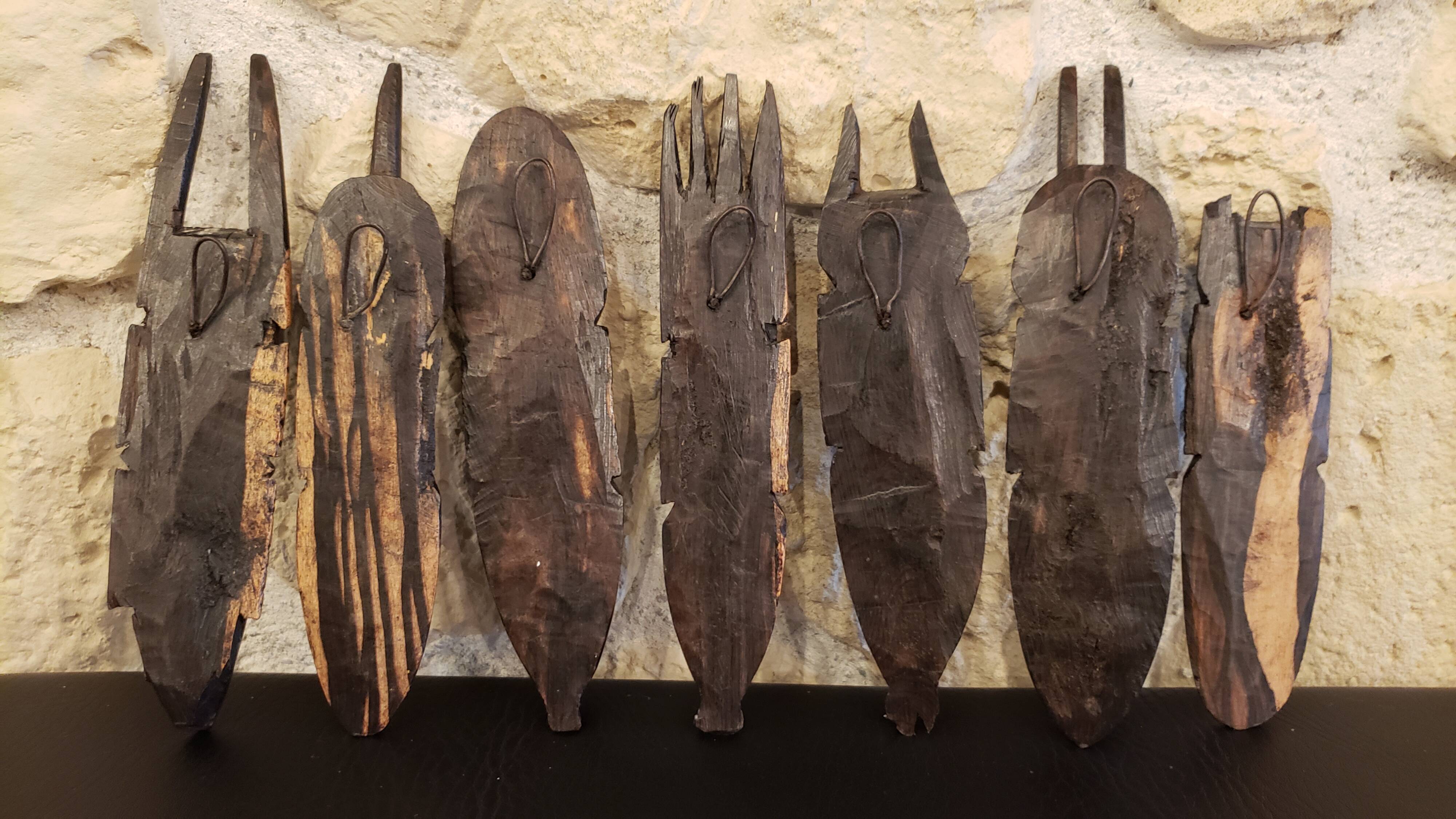 7 weekly African masks in carved wood