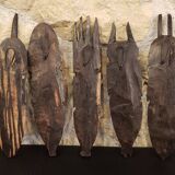 7 weekly African masks in carved wood