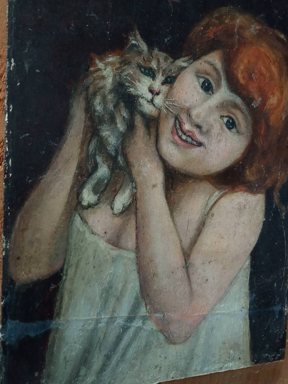 Portrait enfant et chat sur panneau de bois