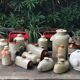 Old hot water bottle made of vintage white earthenware