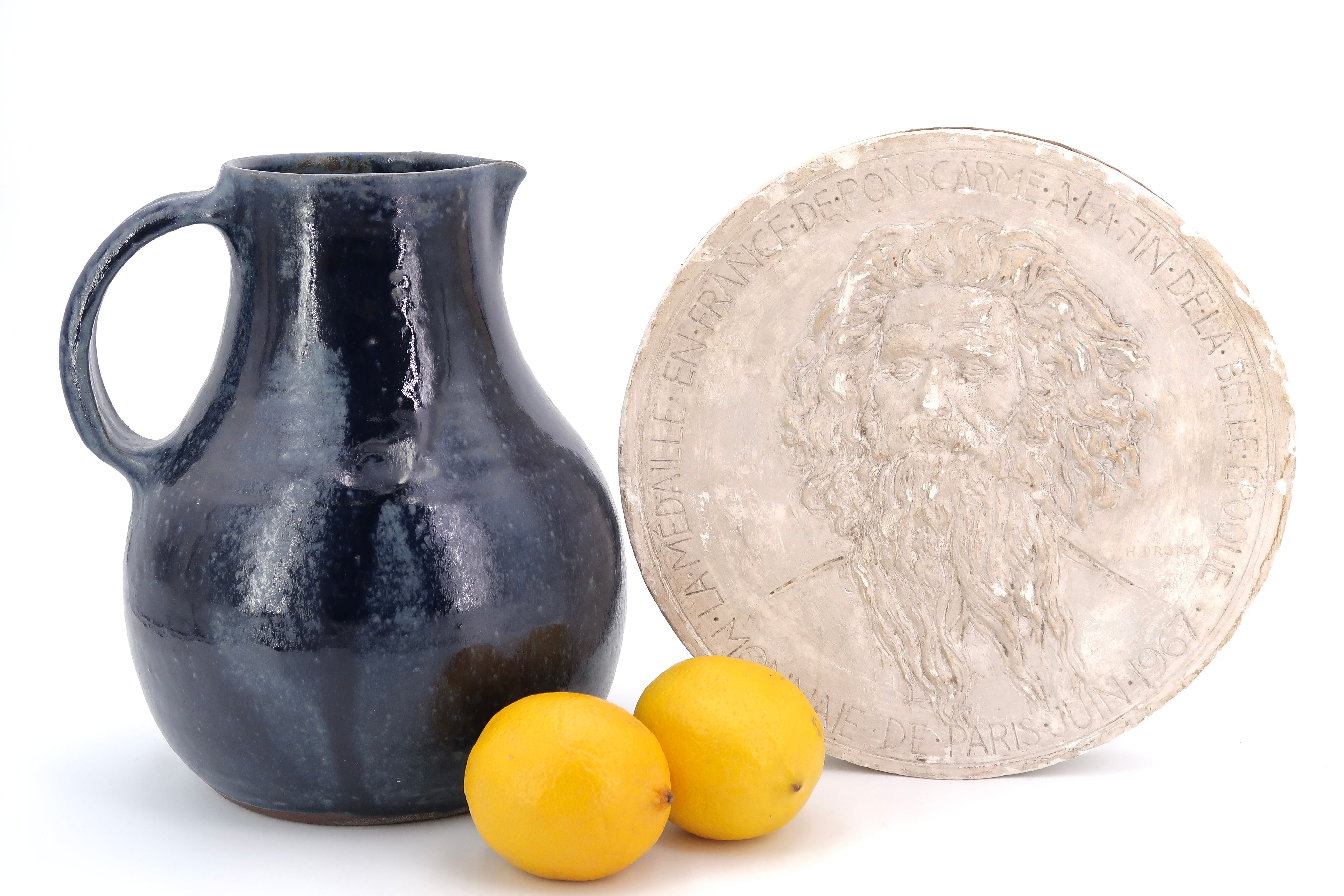 Midnight blue pitcher in sandstone by Jeanne and Norbert Pierlot