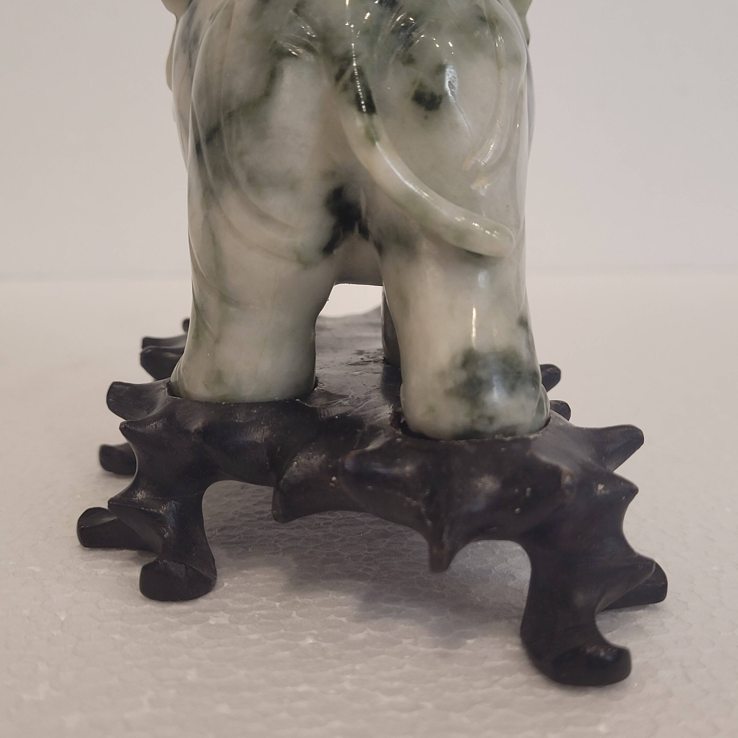 Pair of elephant paperweights, veined marble, 80s - France