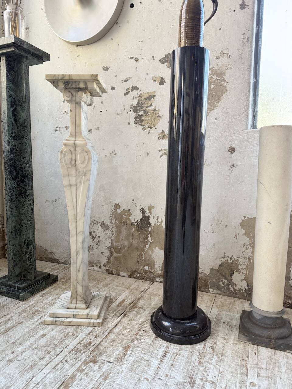 Set of 4 marble columns or pedestals.