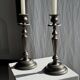 Two large antique silver-plated metal candlesticks, H30