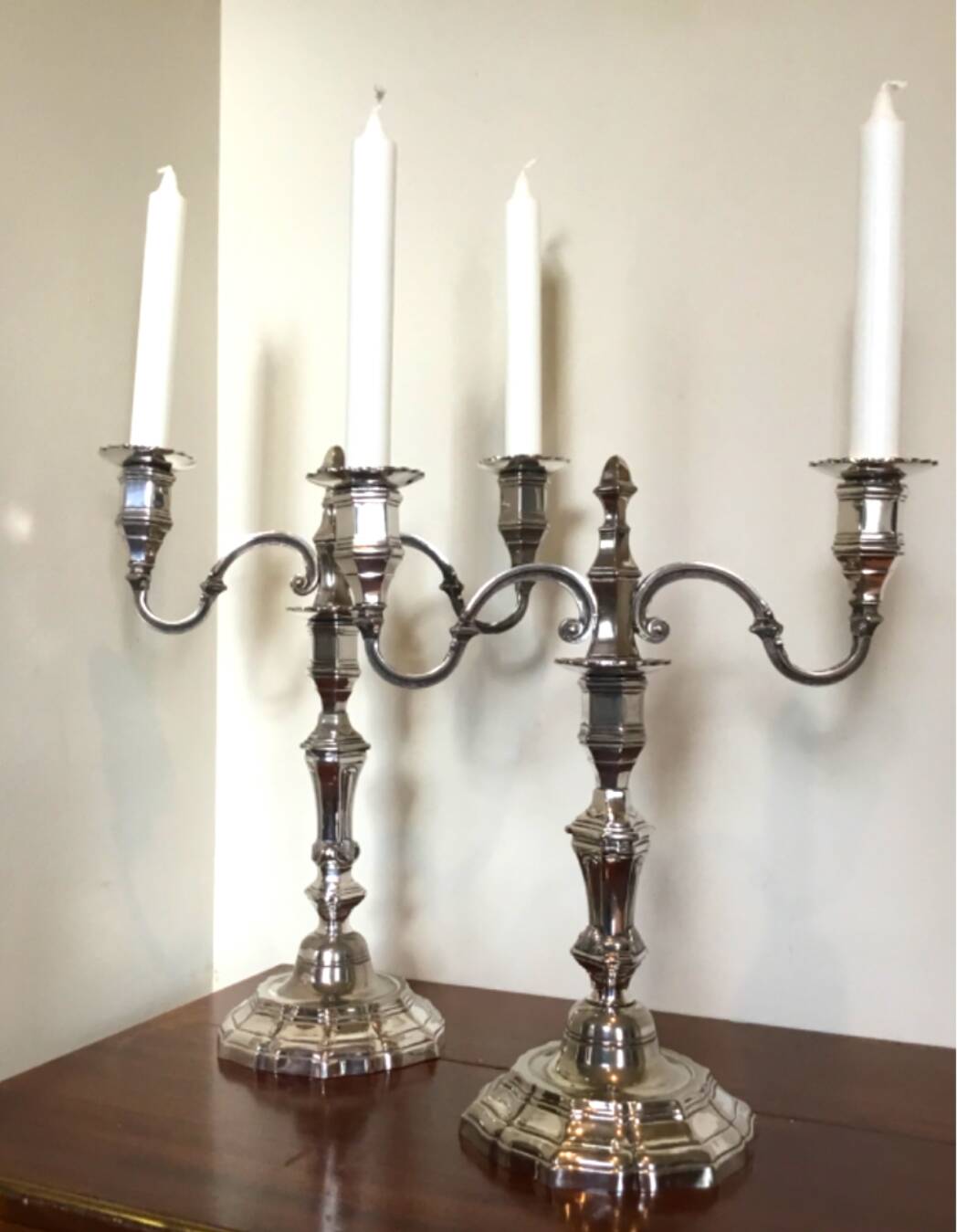 Pair of silver-plated metal candelabra in the Regency style