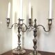 Pair of silver-plated metal candelabra in the Regency style