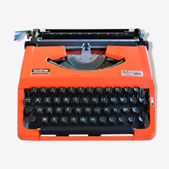 Machine à écrire orange Brother 210, vintage 1970