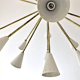 Chandelier Sputnik 24-arm brass and white-ivory lacquered metal