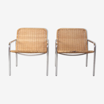 Two rattan lounge chairs