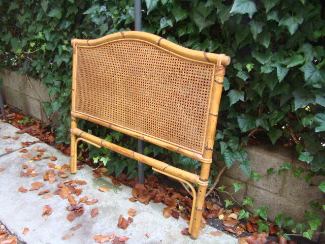 Old rattan wicker headboard